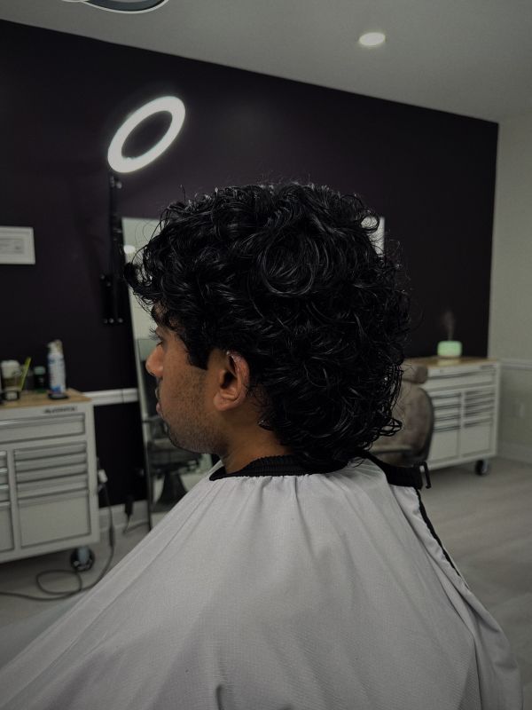 Curly cut shaped at the back