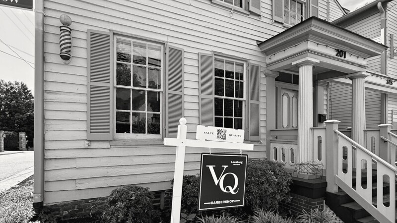 VQ Barbershop at 201 Loudoun St SW: VQ's barber pole on the white clapboard front, the VQ sign by the path and the porch steps
